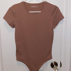 Tan bodysuit